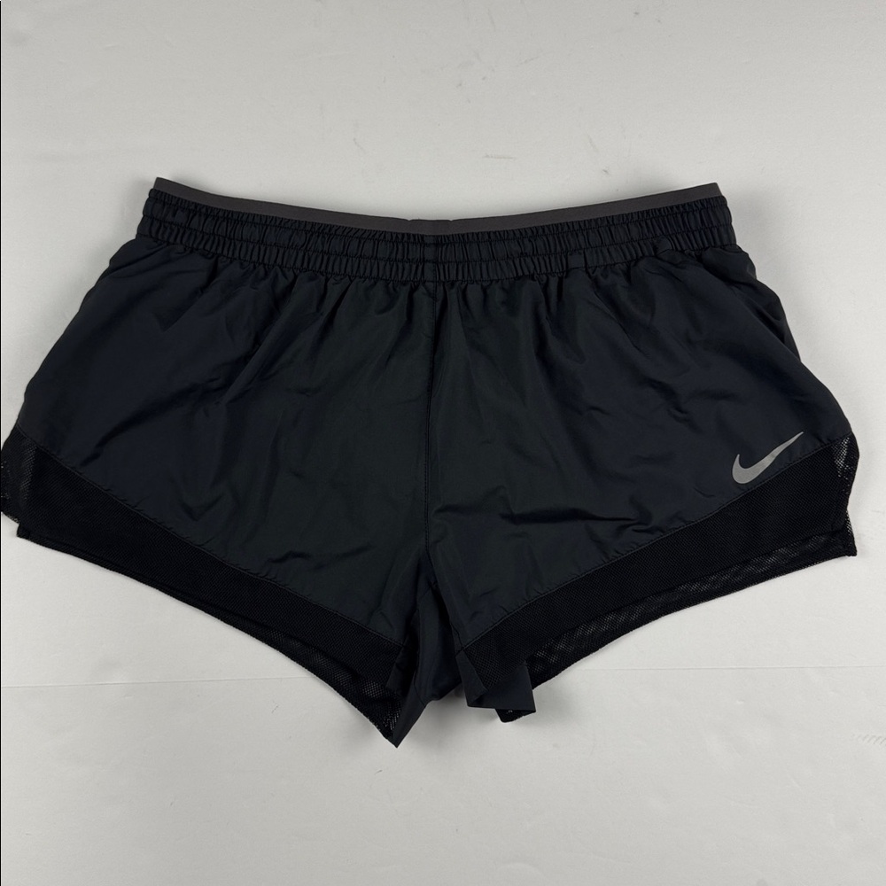 Nike Women's Dri-fit running shorts with liner and mesh trimming size medium